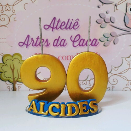 Vela dourada com nome