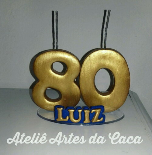 Vela dourada com nome