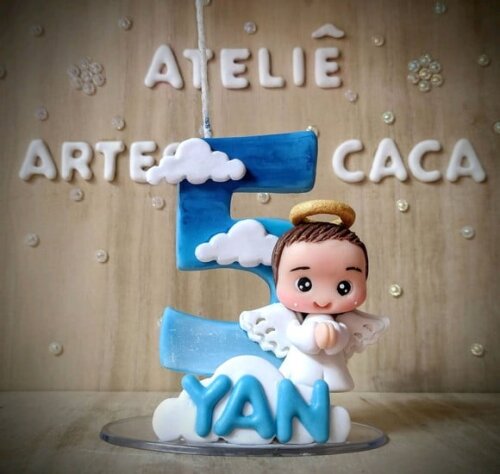 Vela em biscuit para batizado