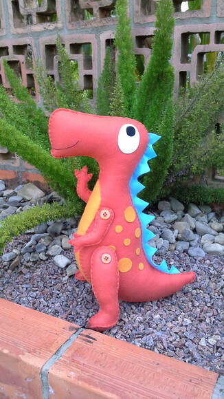 Dinossauro laranja de feltro