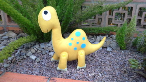 Dinossauro amarelo de feltro
