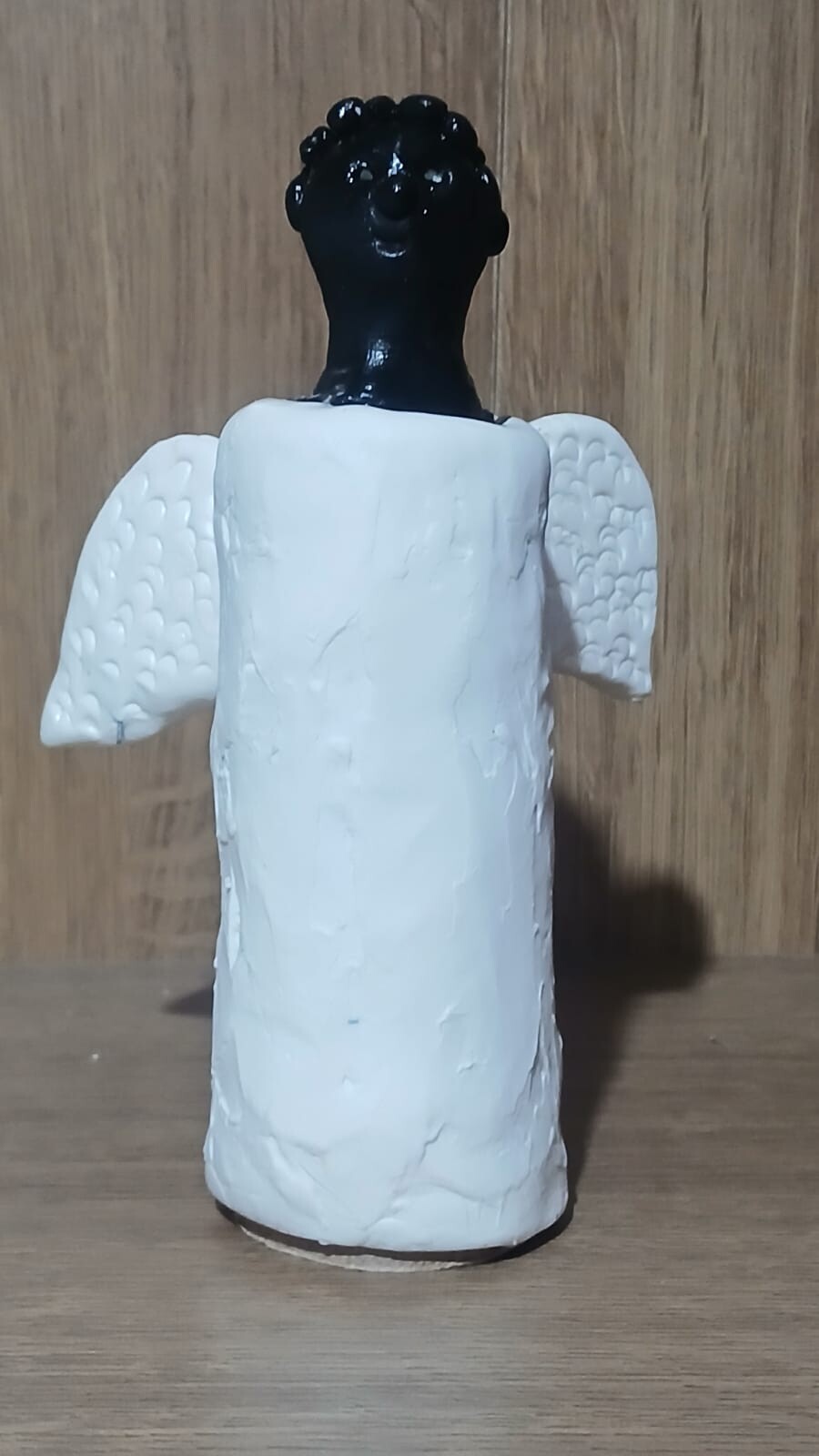 Escultura de anjo Negro