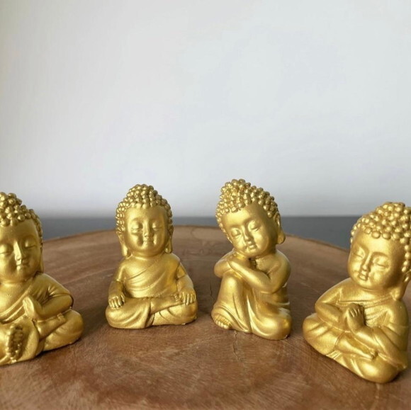 Quarteto de Budas em base de madeira