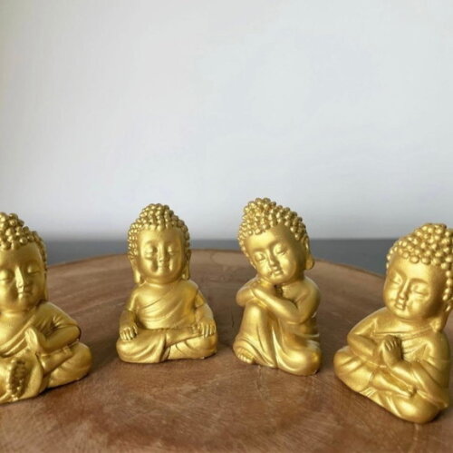 Quarteto de Budas em base de madeira