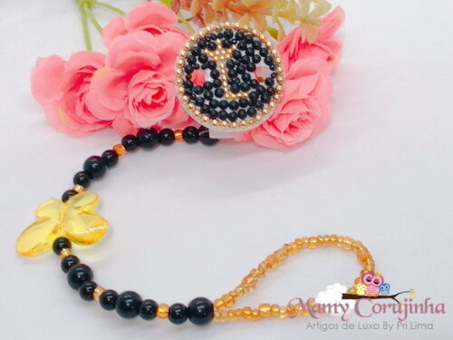 Prendedor luxo L preto e dourado