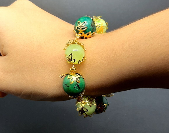 Pulseira em sementes de paxiubão e jades verdes