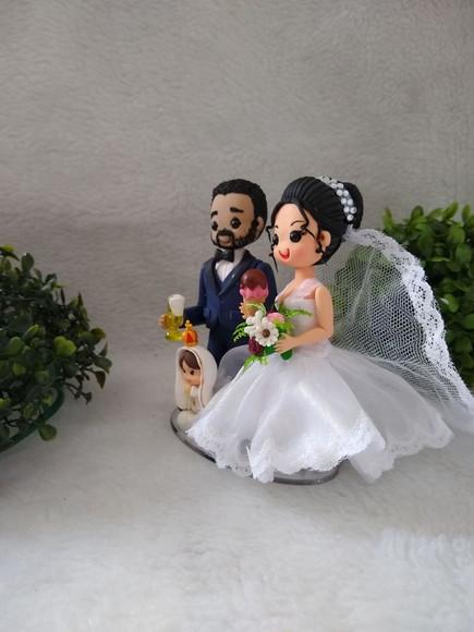 Casal de noivinhos com nossa senhora de Fátima