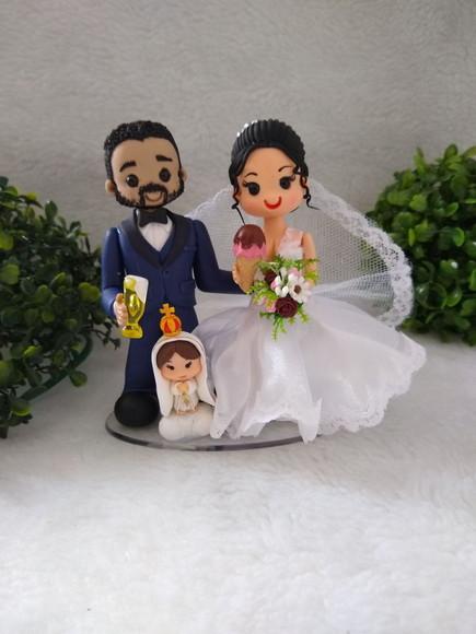 Casal de noivinhos com nossa senhora de Fátima