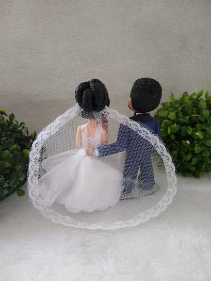 Casal de noivinhos com nossa senhora de Fátima