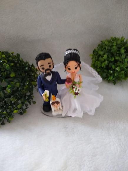 Casal de noivinhos com nossa senhora de Fátima
