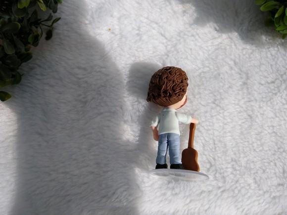 Miniatura personalizada com guitarra