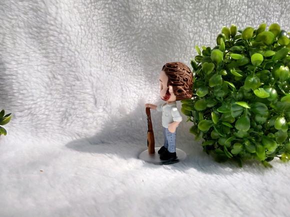Miniatura personalizada com guitarra