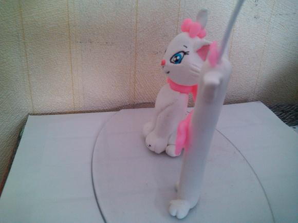 Topo com vela da gata marie