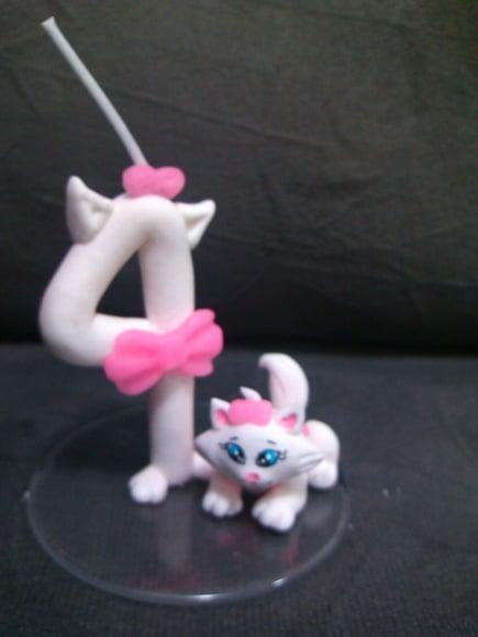 Topo com vela da gata marie
