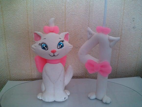 Topo com vela da gata marie