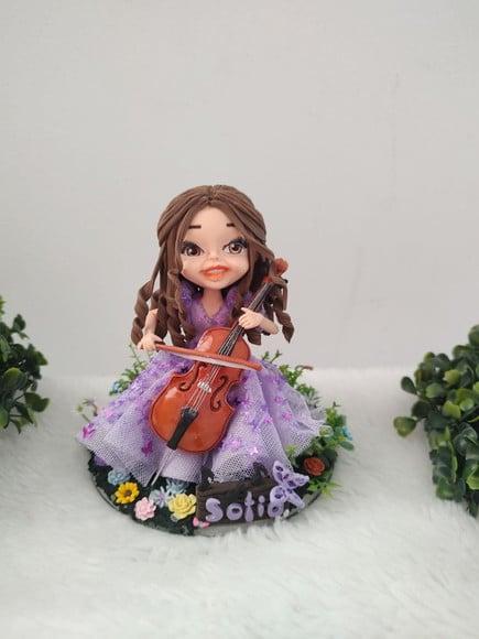 Topo de Bolo 15 Anos Tocando no Jardim