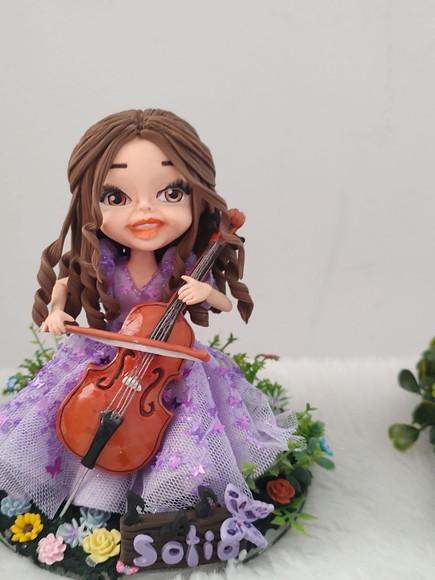 Topo de Bolo 15 Anos Tocando no Jardim