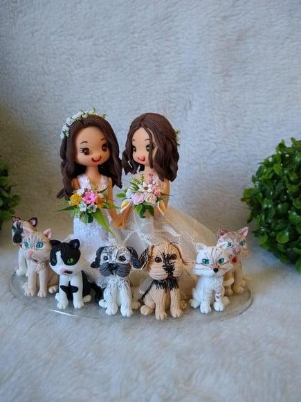 topo de casamento com 7 pets
