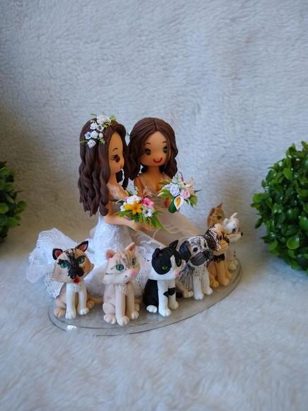 topo de casamento com 7 pets