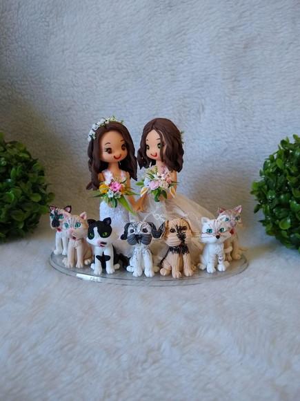 topo de casamento com 7 pets