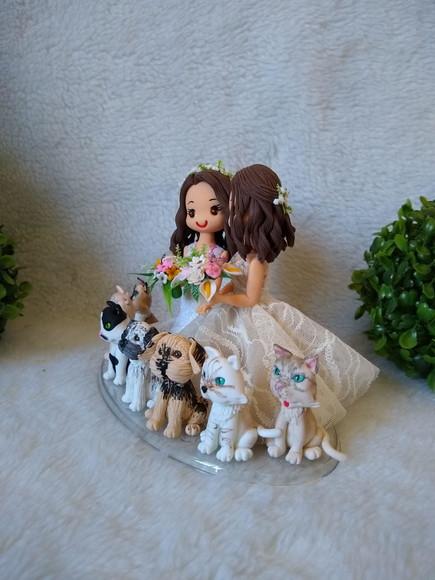 topo de casamento com 7 pets