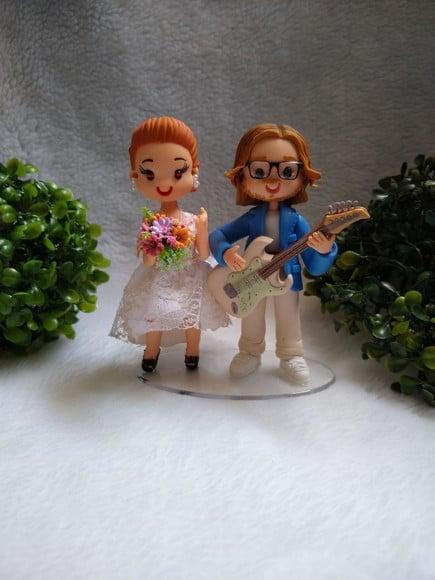 Topo de casamento guitarrista