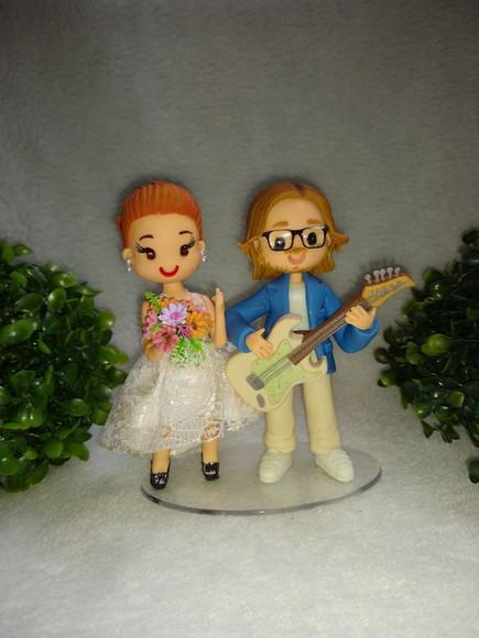 Topo de casamento guitarrista