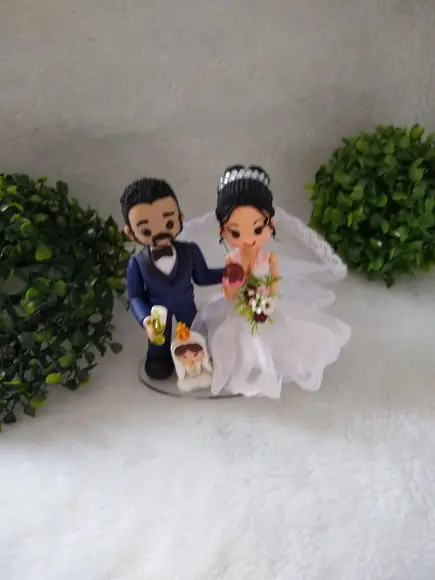 Casal de noivinhos com nossa senhora de Fátima