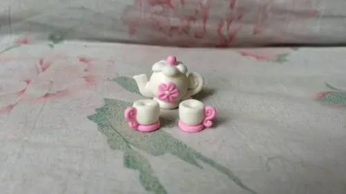 Conjunto chaleira e xicaras