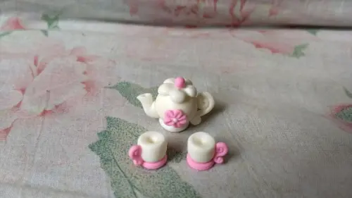 Conjunto chaleira e xicaras