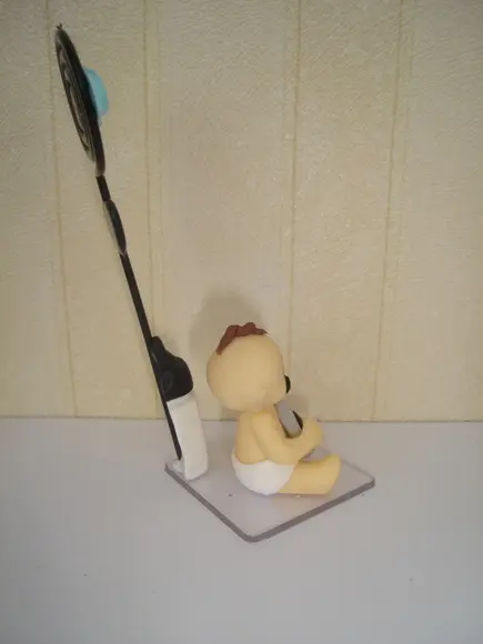 Lembrancinha bebê roqueiro com porta Recado