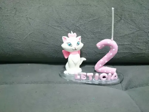 Topo com vela da gata marie