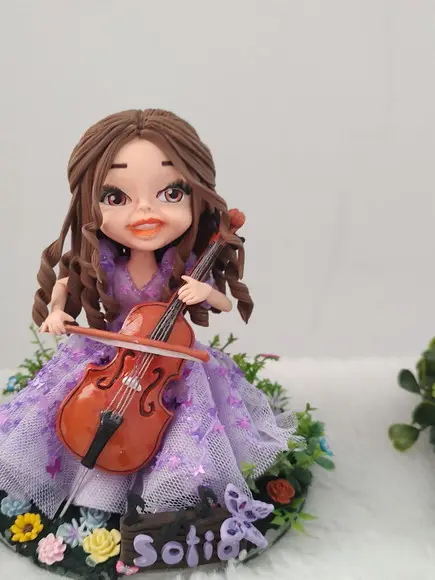 Topo de Bolo 15 Anos Tocando no Jardim
