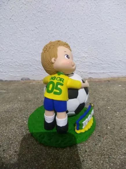 Topo de bolo com vela futebol