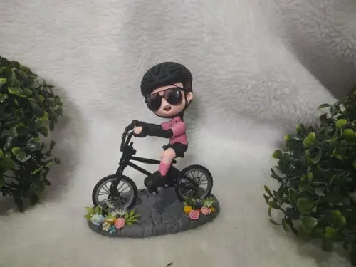 Topo de Bolo Menina na Bicicleta