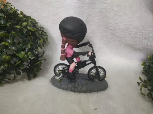 Topo de Bolo Menina na Bicicleta