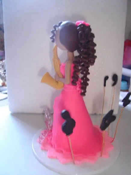 topo de bolo tocando