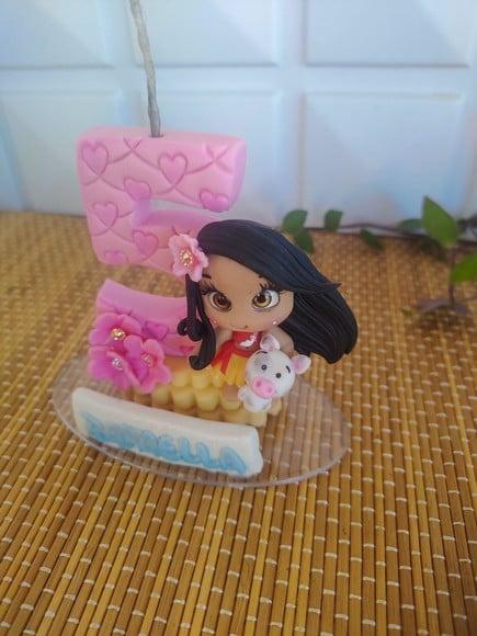 Topo de Bolo Moana em Biscuit