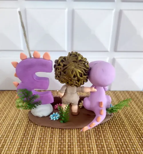 Topo de Bolo Dinossauro de Menina
