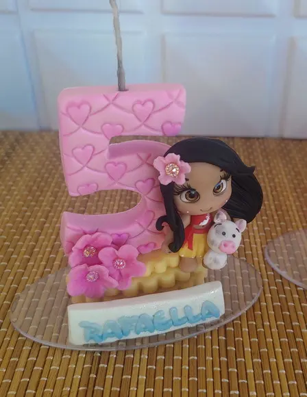 Topo de Bolo Moana em Biscuit