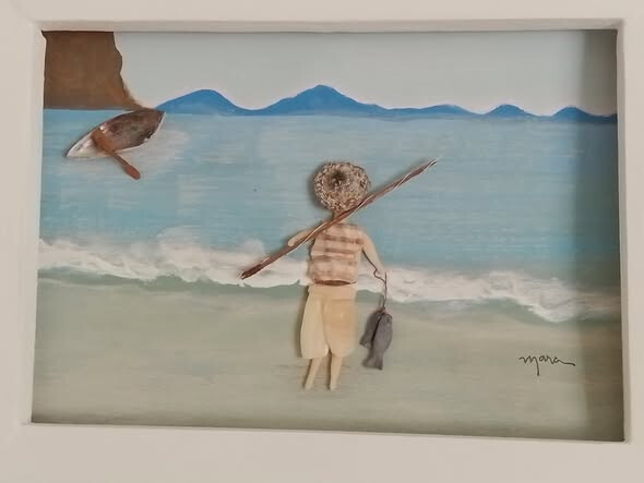 Quadro feito de pedras e conchas Pescador