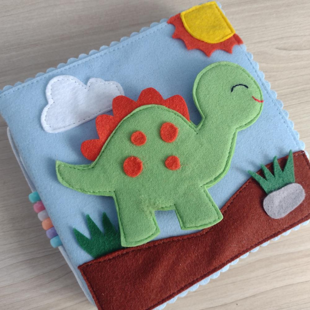 Livro sensorial do dinossauro em feltro para crianças