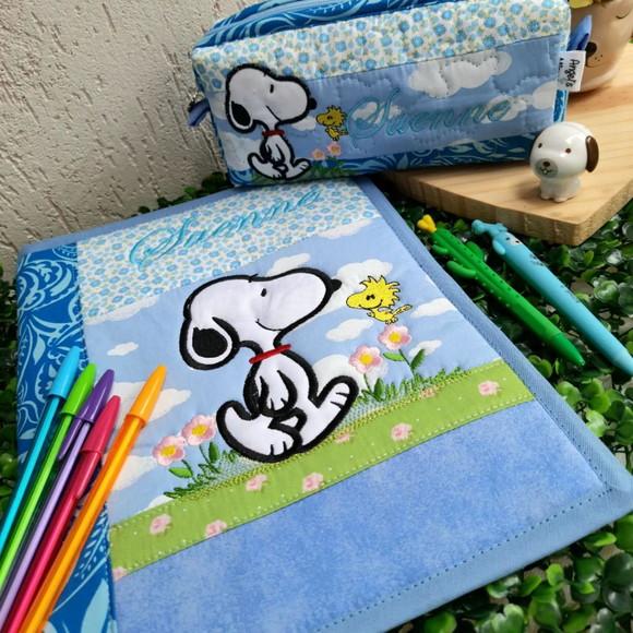 Capa de caderno +estojo snoopy