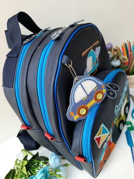 Mochila 3 divisoes Infantil couro sintético brinquedos