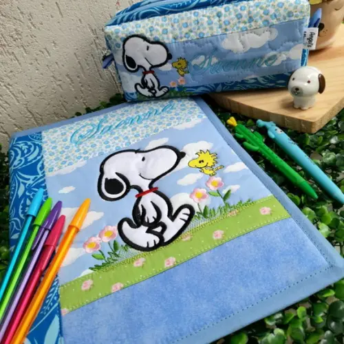 Capa de caderno +estojo snoopy
