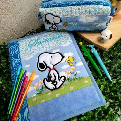 Capa de caderno +estojo snoopy