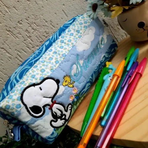 Capa de caderno +estojo snoopy