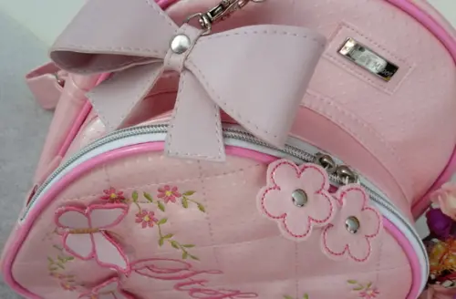 Mochila couro sintético tam. P Jardim encantado