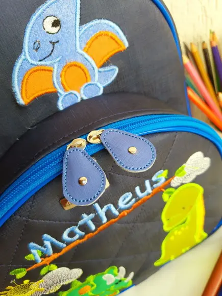 Mochila M Infantil couro sintético Dinossauro