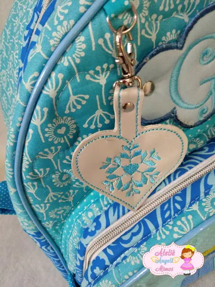 Mochila Tam G + estojo duplo frozen